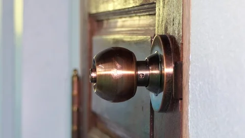 Men's hand opens door knobs.4k Stock Footage 92513026