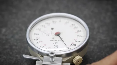 Men's hands check the thickness using Stock Footage 259613527