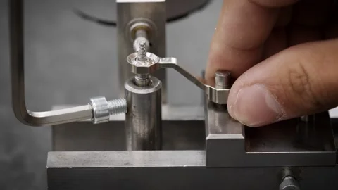 Men's hands check the thickness using Stock Footage 259613571