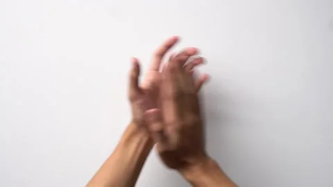 Men's hands clapping on a white background Stock Footage 262434826