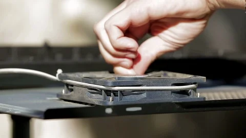 Men's hands clean the garbage cooler Stock Footage 82342088