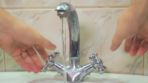 Men's hands close the taps Video stock 106674433