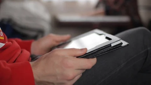 Men's hands control the tablet in the train Stock Footage 86904159
