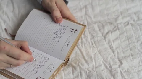 Men's Hands Makes a Record in the Diary Stock Footage 73653751