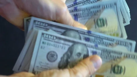 In men's hands a pack of dollars. Stock Footage 114379841