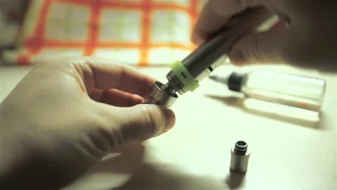 Men's hands siut the electronic cigarette for background. Stock Footage 72414848