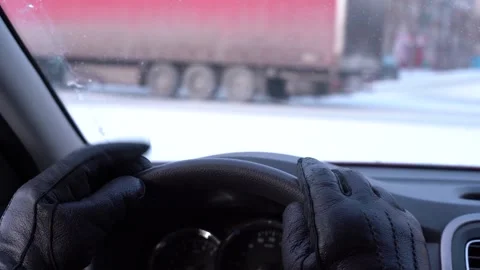 Men's Hands on the Steering Wheel. View Over the Driver's Shoulder Vídeo Stock 149686829