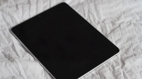 Men's Hands With a Tablet on the Bed Stock-Footage 73653397