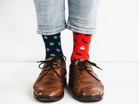 Men's legs in bright, colorful socks and stylish shoes Stock Photos