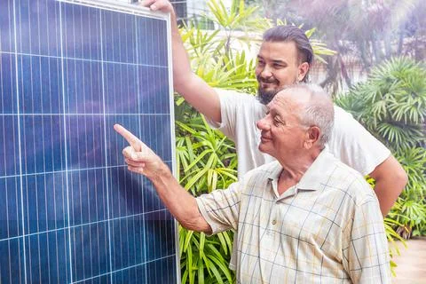 Mens looking for solar panel Stock Photos