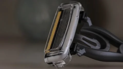 Mens Razor - Macro - Pan Right Stock Footage 148442426