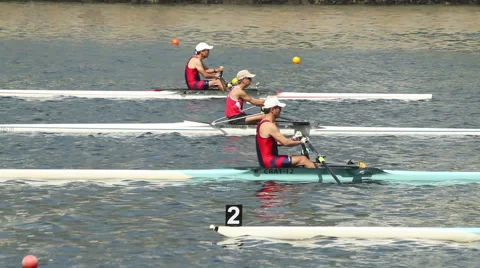 Men's single sculls rowing at the start of a race Stock Footage 52222933