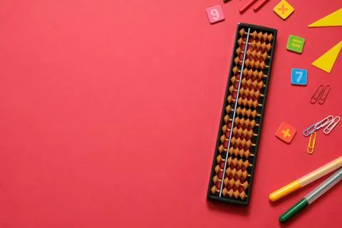 Mental arithmetic and math concept: colorful pens and pencils, numbers, abacus Stock Photos