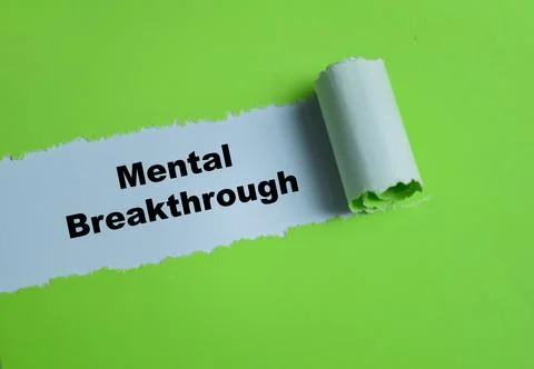 Mental breakthrough text written in torn paper. 写真素材