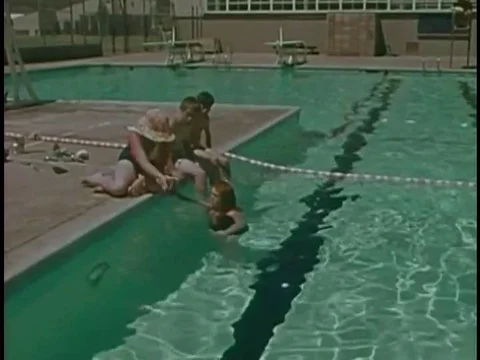 Mentally challenged children learn to dive for objects with confidence in a Video stock 74948499