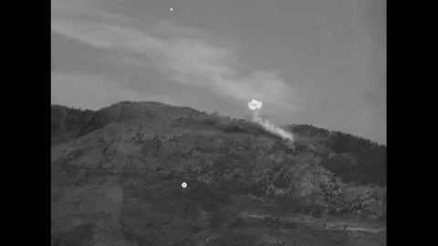 MENTON - 1944 - German shells land on a hillside at Menton, France. Stock Footage 328170609