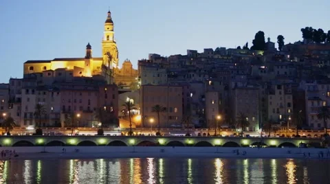 Menton town in the night with light reflections in the sea Video stock 64206501