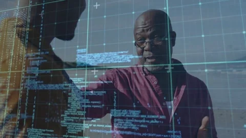 Mentor studying holographic code appearing on transparent grid and teaching Stock Footage 328312283