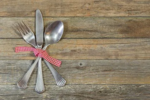 Menu dinner table place setting with cutlery set decoration on rustic wooden Stock Photos