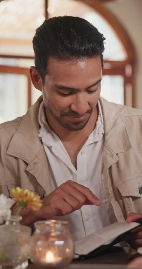 Menu, man and customer with order in diner for food option, service or choice on Stock Footage 340610792