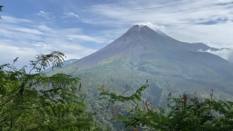 Merapi Volcano mountain in the morning with forest and hills Stock-Footage 347541519