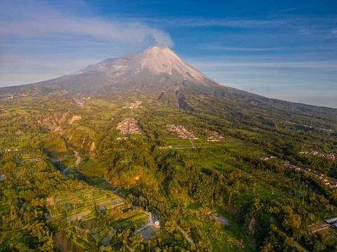 Merapi volcano at sunrise in Indonesia, Active volcano scenery Stock Photos