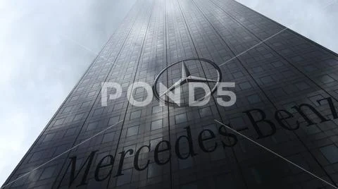 Mercedes-Benz logo on a skyscraper facade reflecting clouds. Editorial 3D Stock Illustration