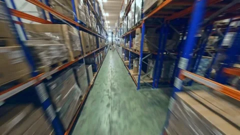 Merchandise Warehouse With Boxes Of Goods Stored On The Racks. - aerial 库存影片 244321690