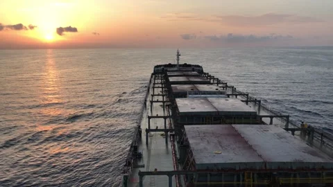 A merchant ship underway at sea, view of deck from bridge Stock Footage 296596986
