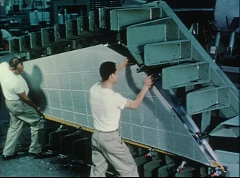 Mercury Project engineers assembling Little Joe booster vehicle Stock Footage 297464798