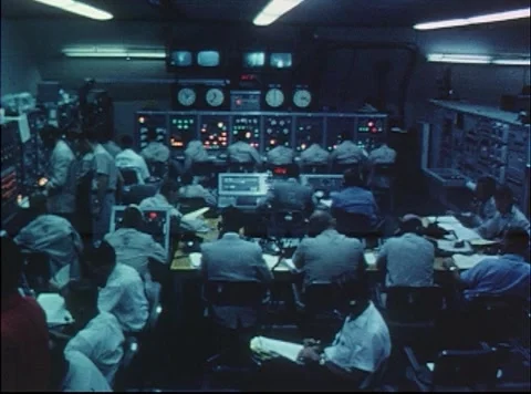 Mercury Project engineers recording data at the blockhouse during launch Stock Footage 297465310