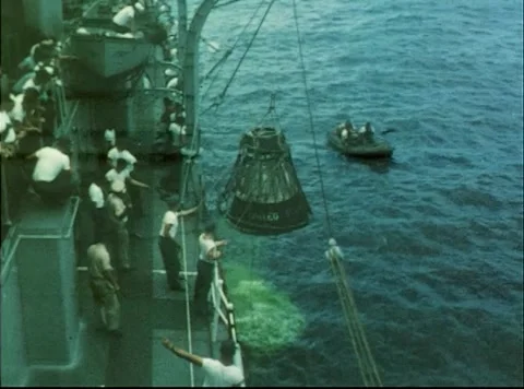 Mercury Project U.S. Navy USS Destroyer Strong recovering capsule after launch Stock Footage 297465264