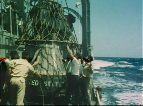 Mercury Project U.S. Navy USS Destroyer Strong recovering Big Joe capsule Stock Footage 297465279