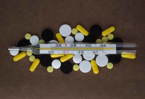 Mercury thermometer on tablets Stock Photos