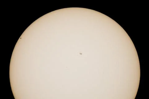 Mercury transit through the disk of the Sun close up Stock Photos