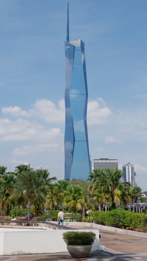 Merdeka 118 Tower Skyscraper Pedestrians Walking Kuala Lumpur Vertical 4K Stock Footage 342311809