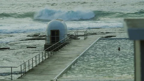 Merewether Baths, man swimming in the background Video stock 160416501
