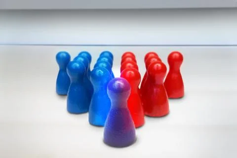 Merging or combining game figures. Leadership or teamwork business concept. Stock Photos