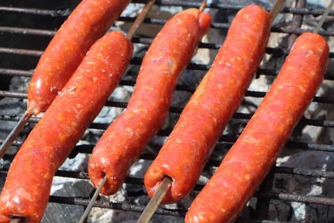Merguez on barbecue Stock Photos