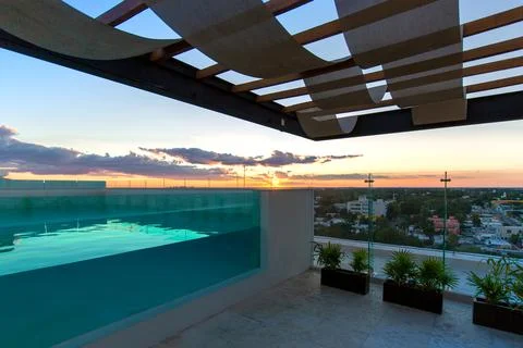 Merida, Mexico, swimming pool at the roof of the upscale hotel with panoramic Stock Photos