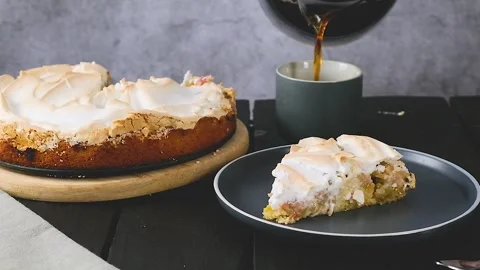 Meringue cake on the table. Time for coffee and cake Stock Footage 259516989