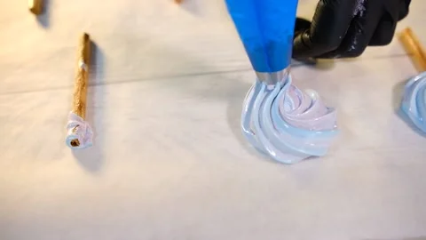 Meringue on a stick in the shape of lollipops Stock Footage 194736728