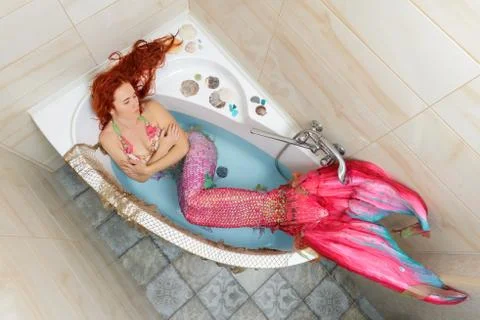Mermaid in bath Stock Photos
