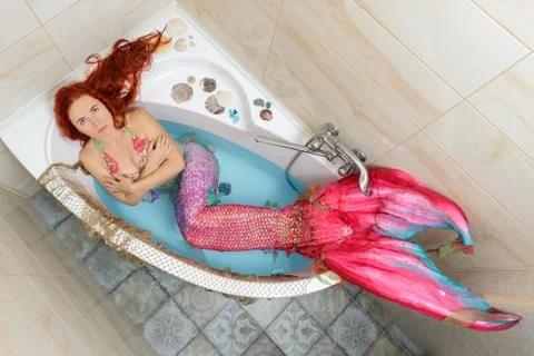 Mermaid in bath Stock Photos