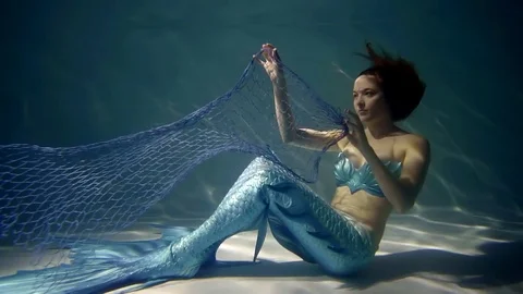 Mermaid got in the net Stock Footage 84793089