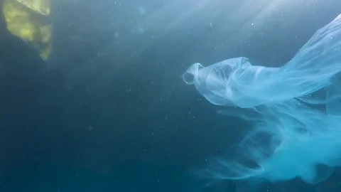 Mermaid Trapped in Plastic Bag Underwater, Pollution. Sirena en Plastico Stock Footage 291682353