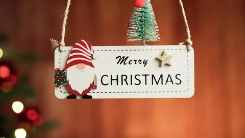 Merry Christmas patch with blurred tree in the background Stock Photos