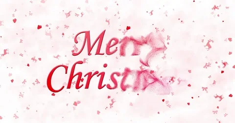 Merry Christmas text formed from dust and turns to dust horizontally on white Stock Footage 70290521
