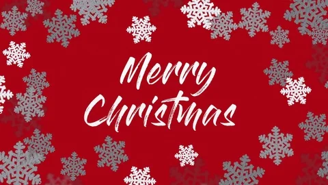 Merry Christmas text, in front of red background with spinning snowflakes Video stock 81438851