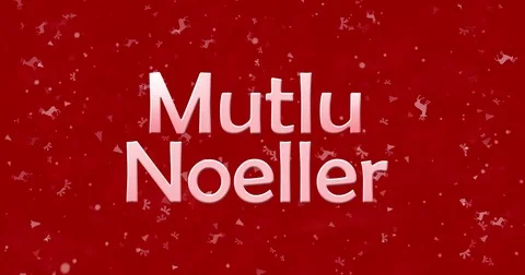 Merry Christmas text in Turkish "Mutlu Noeller" turns to dust from bottom on red Stock Footage 70437406
